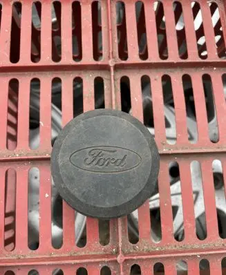 Ford Escort Original wheel cap 81AB1000FAGA 85319