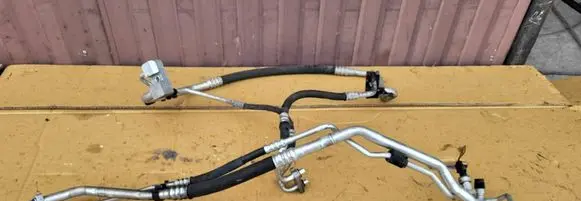 Opel Corsa D Air conditioning (A/C) pipe/hose 13203336