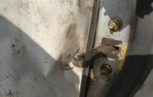Rear door check strap stopper