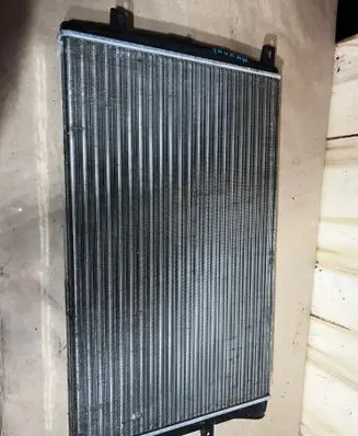 Volkswagen Touran I Coolant radiator TH042138