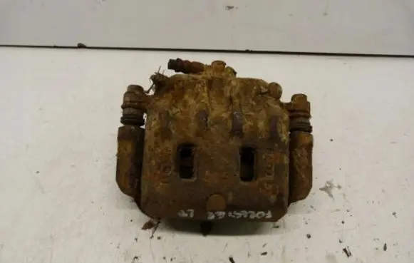 Subaru Forester SF Front brake caliper