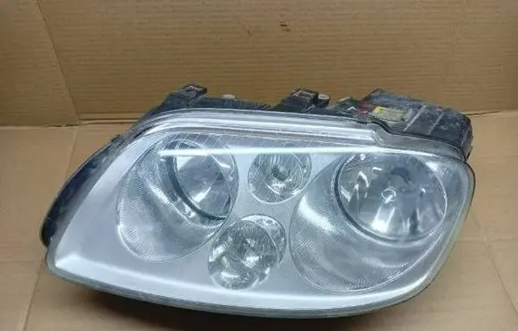 Volkswagen Touran I Headlight/headlamp 1T0941005D