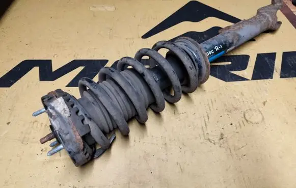 Front shock absorber with coil spring
