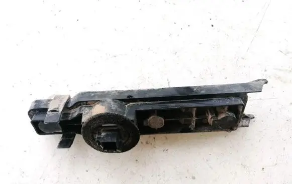 Tail light bulb cover holder
