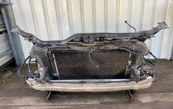 Radiator support slam panel