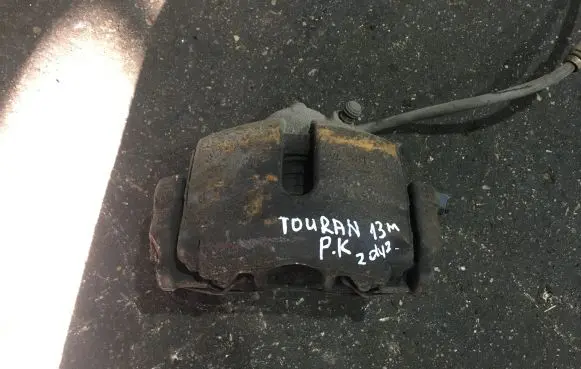 Volkswagen Touran II Front brake caliper