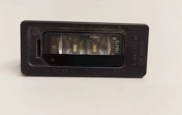 Volkswagen Golf VII Number plate light 3AF943021A