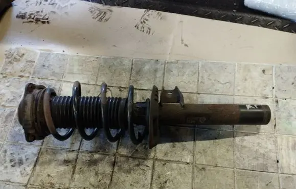 Skoda Octavia Mk2 (1Z) Front shock absorber with coil spring