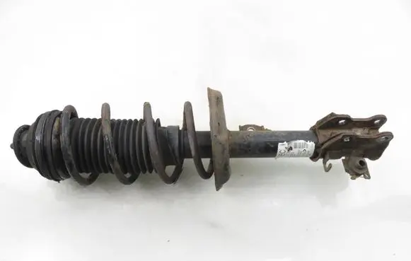 Opel Corsa D Front shock absorber with coil spring 13214353