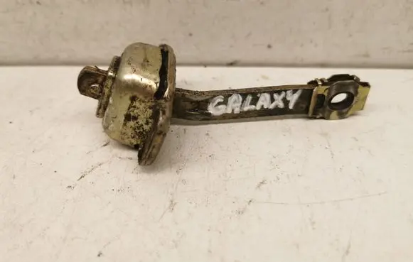 Front door check strap stopper
