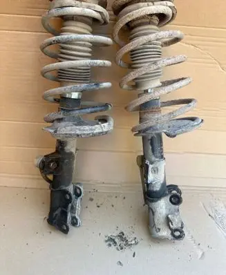 Volvo V70 Front shock absorber with coil spring 334611
