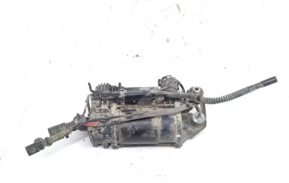 Volkswagen Touareg I Air suspension compressor/pump 7L0616006C