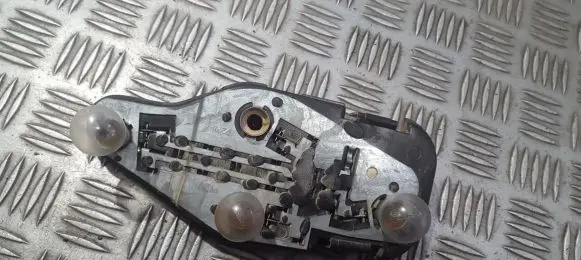 Nissan Primera Tail light bulb cover holder