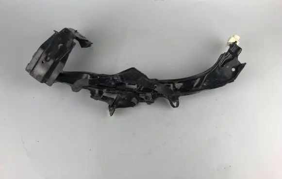 Subaru Impreza II Headlight/headlamp mounting bracket