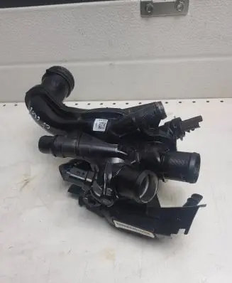 Thermostat/thermostat housing
