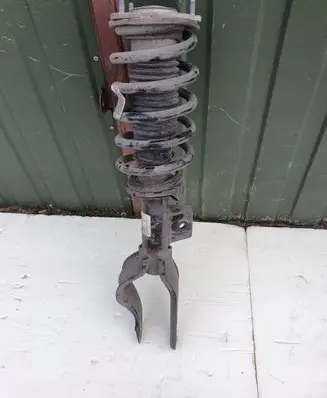 Tesla Model 3 Front shock absorber with coil spring 104436800F