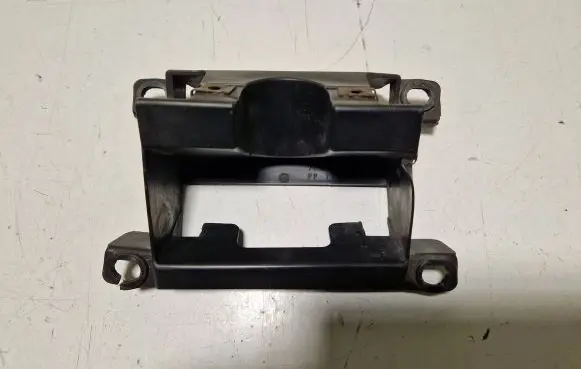 Volkswagen Touareg I Headlight washer nozzle holder 7L6807361