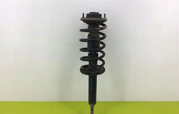 Volkswagen PASSAT B5 Front shock absorber with coil spring 