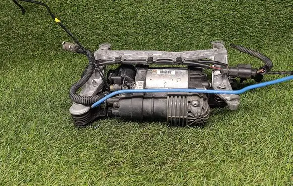 Volkswagen Touareg II Air suspension compressor/pump 7P0616006E 15150000523 ATE0101916