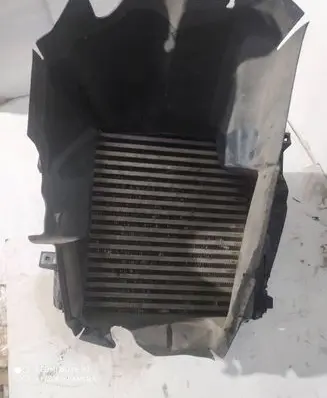 Volkswagen Touareg II Intercooler radiator 7L6145804B