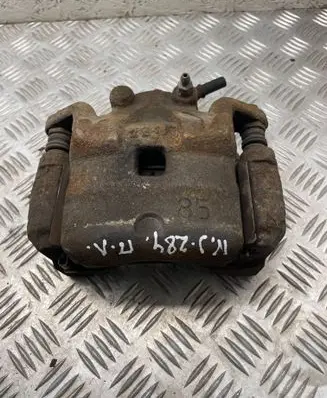 Nissan Juke I F15 Front brake caliper