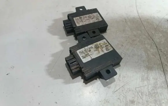 Volkswagen Touareg I Alarm control unit/module 7L0907719