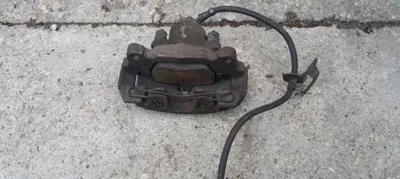 Volkswagen Touran I Front brake caliper