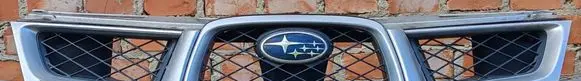 Subaru Impreza II Front bumper upper radiator grill