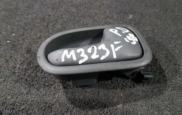 Mazda 323 F Front door interior handle