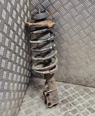 Front shock absorber with coil spring