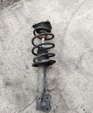 KIA Sportage Front shock absorber with coil spring 546603U000