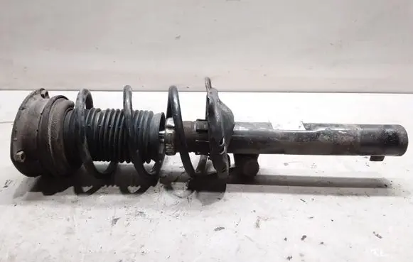 Volkswagen Golf VII Front shock absorber with coil spring 5Q0413023FJ