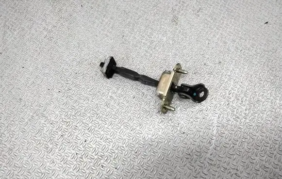 Subaru Outback Front door check strap stopper
