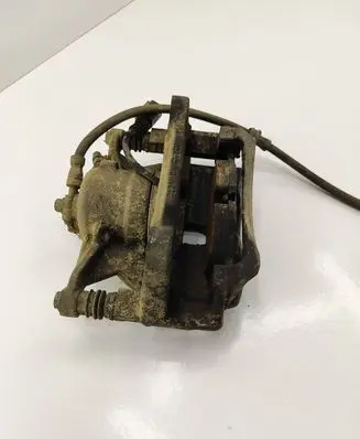 Volkswagen Golf VII Front brake caliper