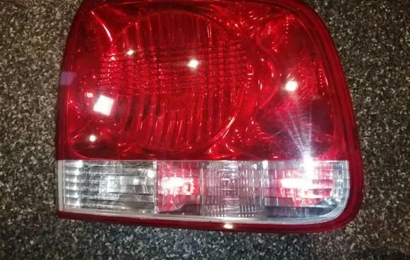Volkswagen Touareg I Tailgate rear/tail lights 7L6945093H