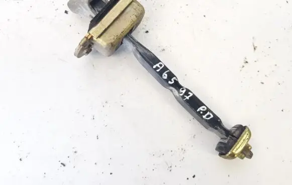 Front door check strap stopper