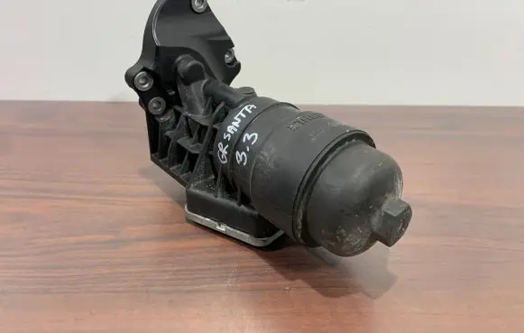 Hyundai Santa Fe Oil filter mounting bracket 263003CAB1