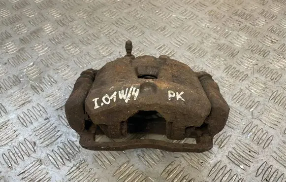 Subaru Impreza II Front brake caliper