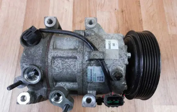 KIA Sportage Air conditioning (A/C) compressor (pump) CA500NFJAA04 97701D7600