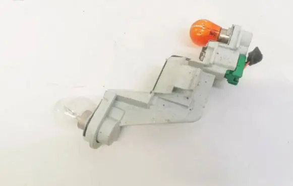 Volvo V50 Tail light bulb cover holder
