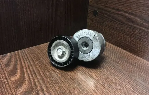 Fiat Fiorino Timing belt/chain tensioner 55244469