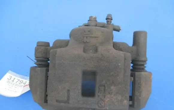 Mazda 323 Front brake caliper