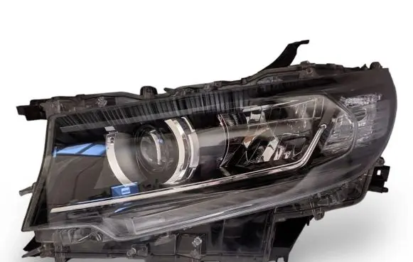Toyota Land Cruiser (J200) Headlight/headlamp 8118560N20