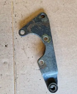 Volkswagen Golf II Power steering pump mounting bracket 037145521
