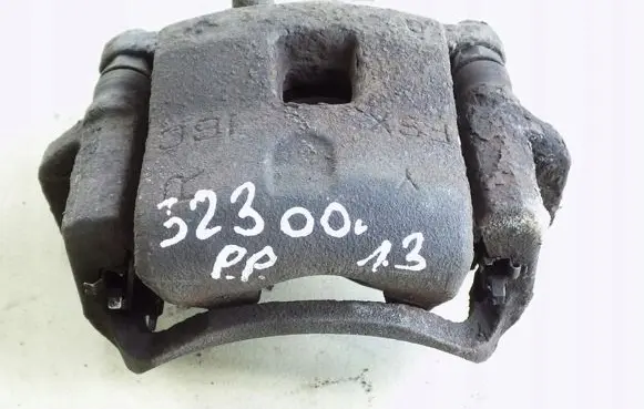 Mazda 323 Front brake caliper