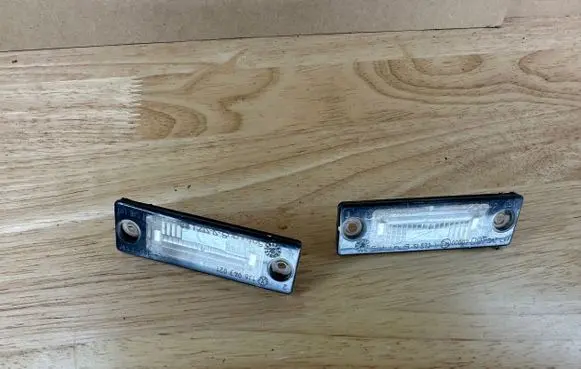 Volkswagen PASSAT B6 Number plate light 1J6943021
