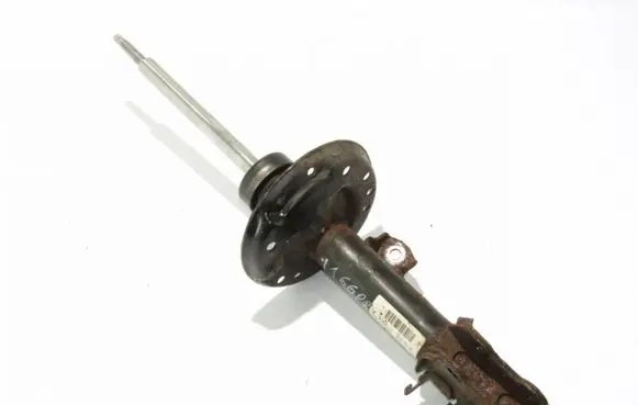 Opel Corsa D Front shock absorber/damper 13214353
