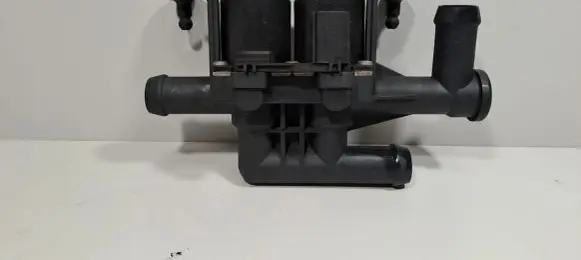 Coolant heater control valve