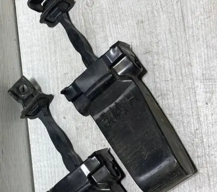 Rear door check strap stopper
