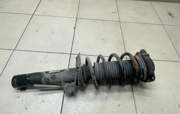 Volkswagen PASSAT B6 Front shock absorber with coil spring